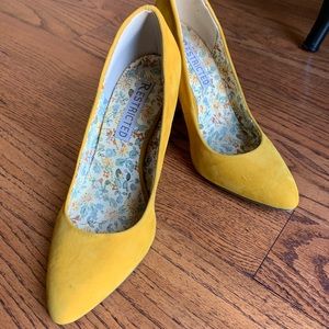 Restricted Yellow Suede Pumps